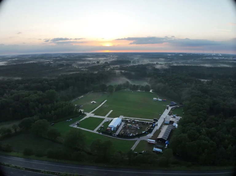 Sunrise aerial of the empty De Lilse Bergen site before the Sunrise Festival 2026 build