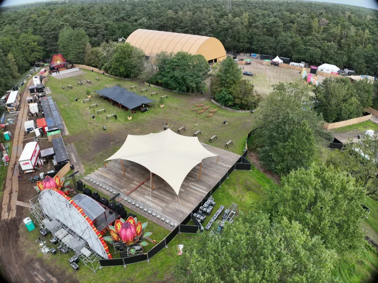 Aerial of Sunset Festival 2026 at De Lilse Bergen: stretch tent, stages and the large hall